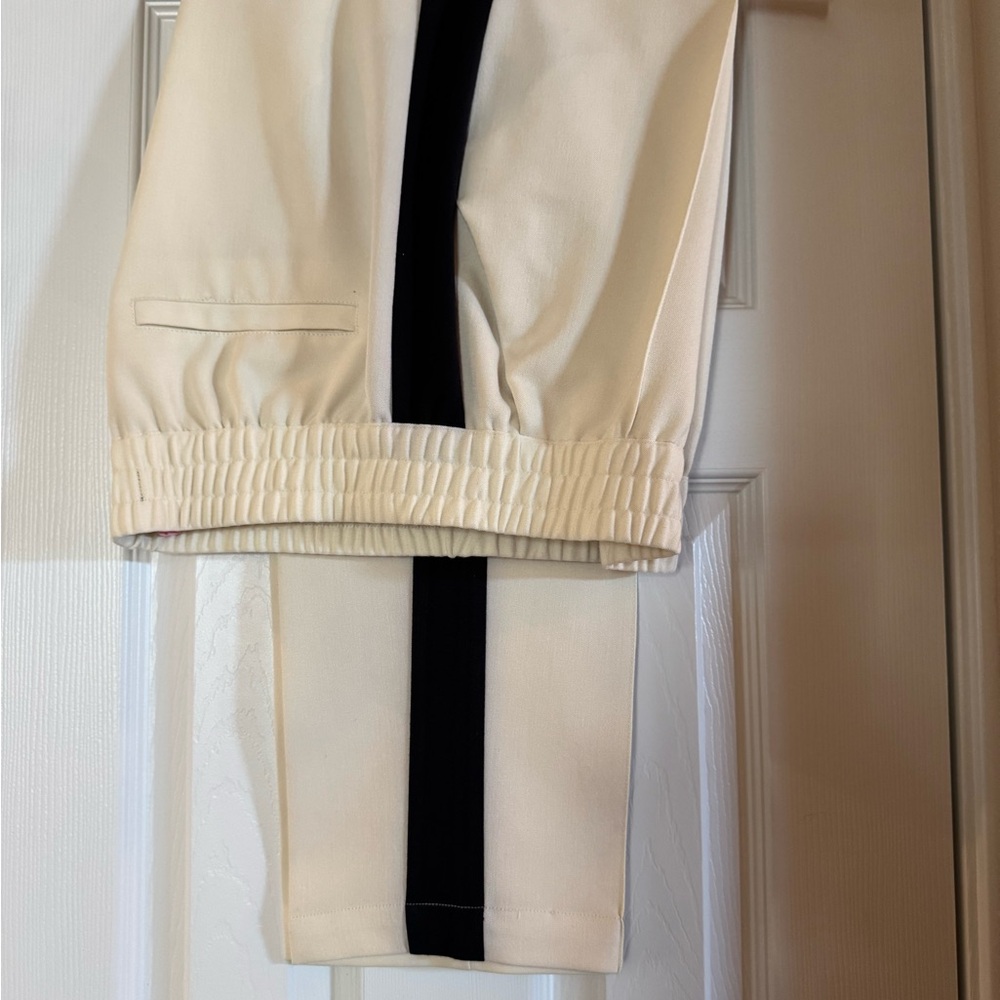 Elegant Cream Skinny Pants with Black Stripe